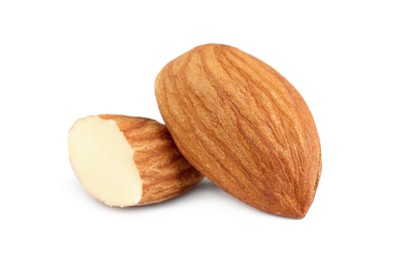 Photo of Organic almond nuts on white background, closeup. Healthy snack