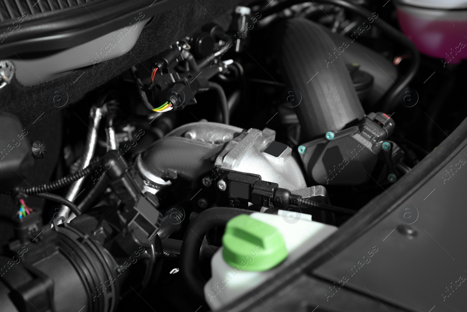 Photo of Closeup view of engine bay in modern car