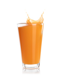 Photo of Juice splashing out of glass isolated on white