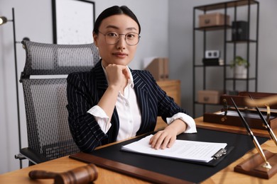 Photo of Portrait of notary at table in office