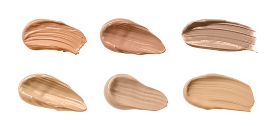 Image of Set with different shades of liquid skin foundation on white background, top view. Banner design