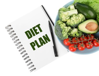 Photo of Notebook with phrase Diet Plan and different products on white background, top view