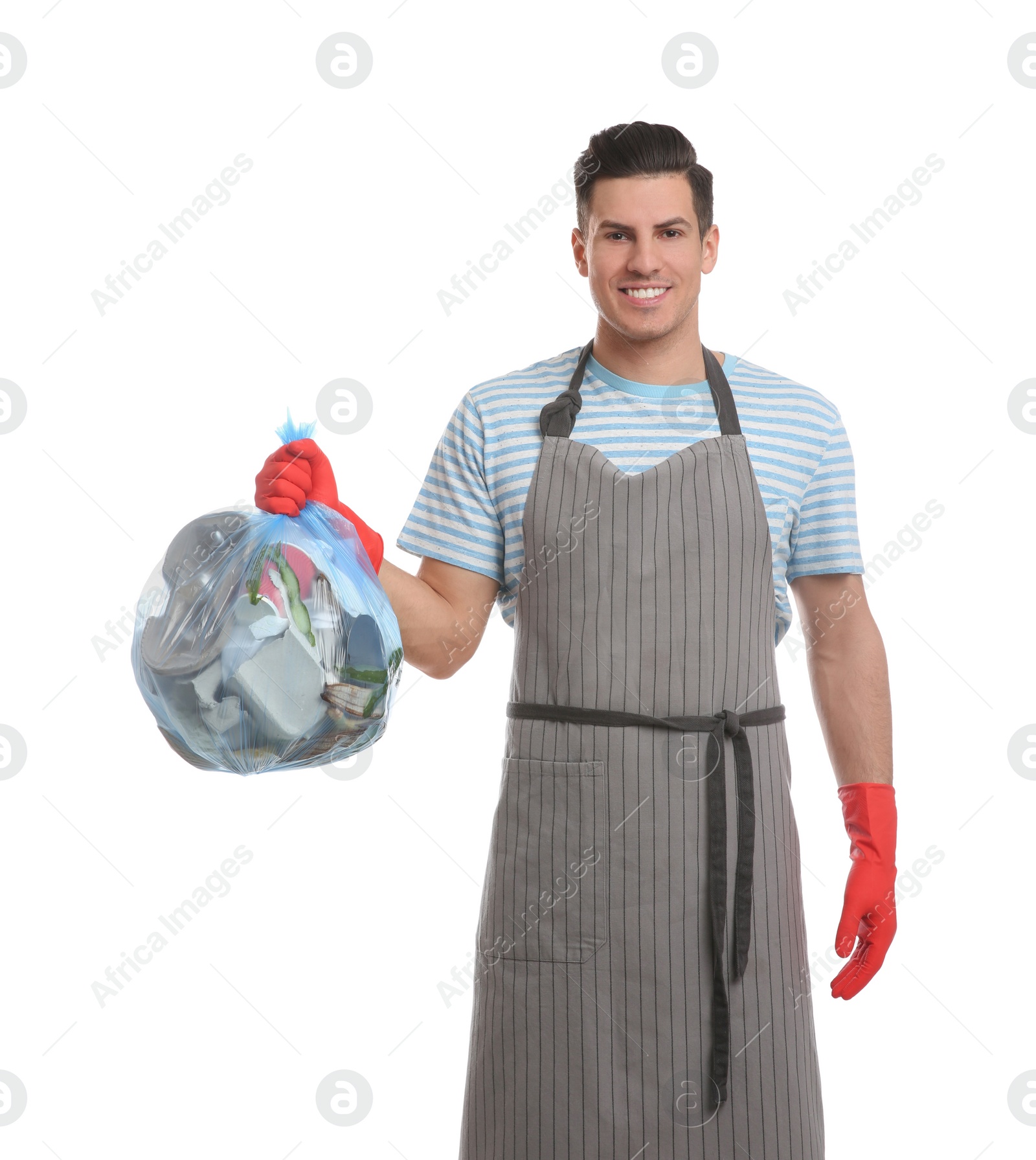 Photo of Man holding full garbage bag on white background