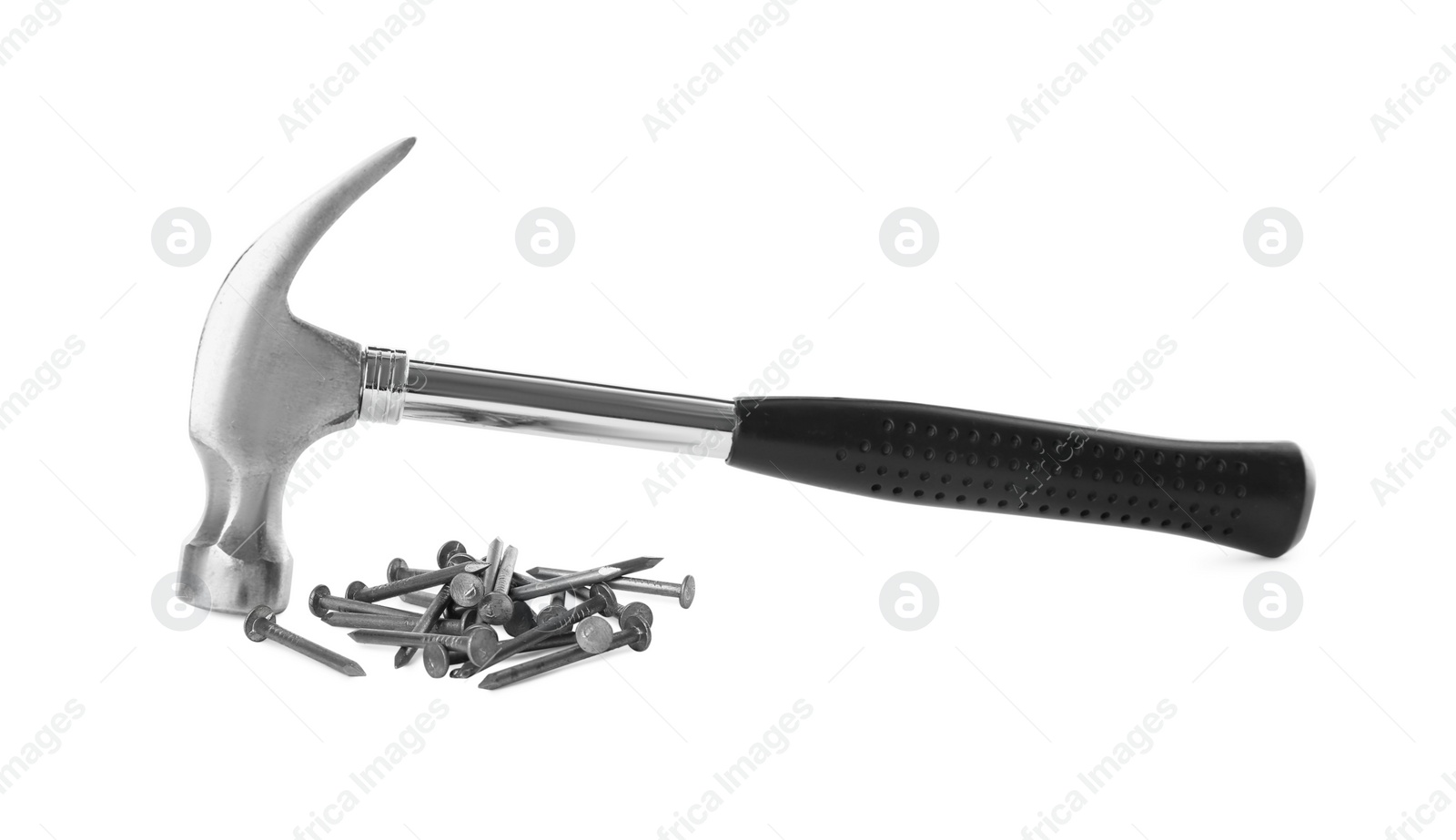 Photo of Hammer and metal nails on white background