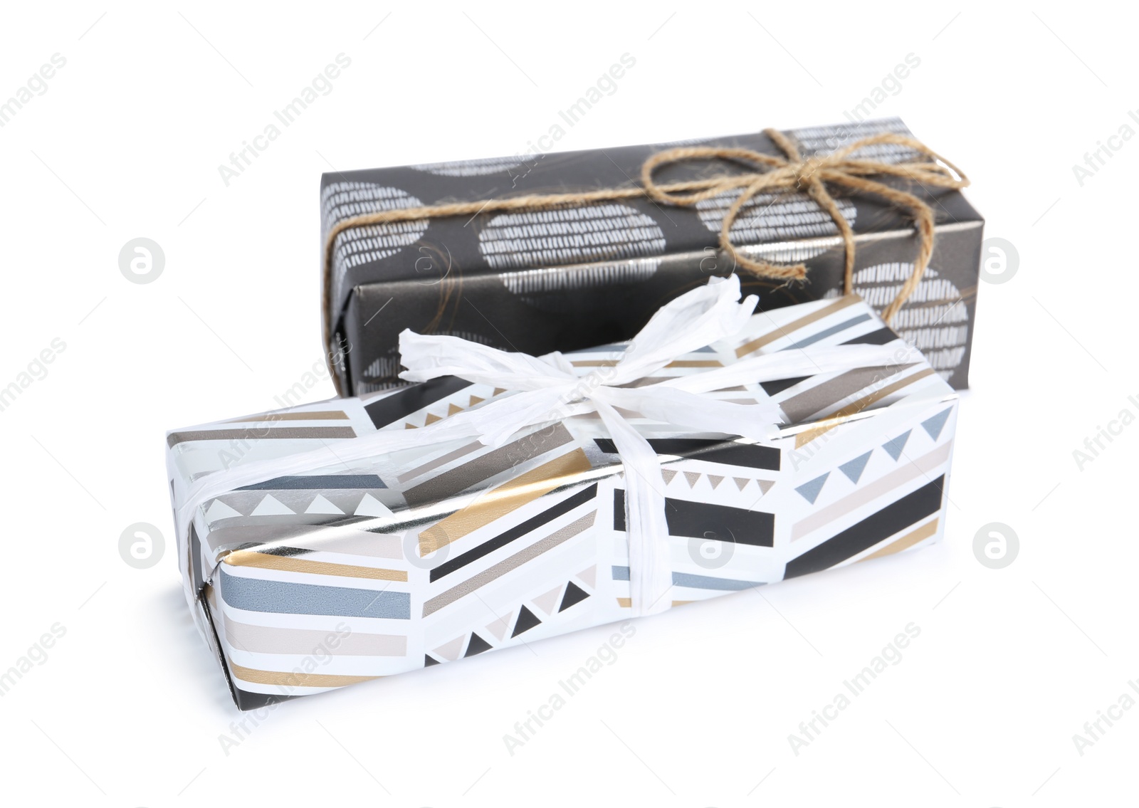 Photo of Beautiful gift boxes with bows on white background