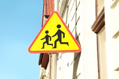 Traffic sign Children near building on sunny day