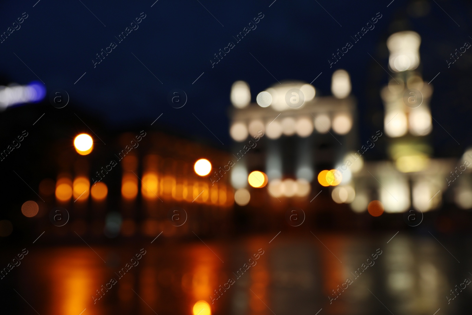 Photo of Blurred view of beautiful city at night. Bokeh effect