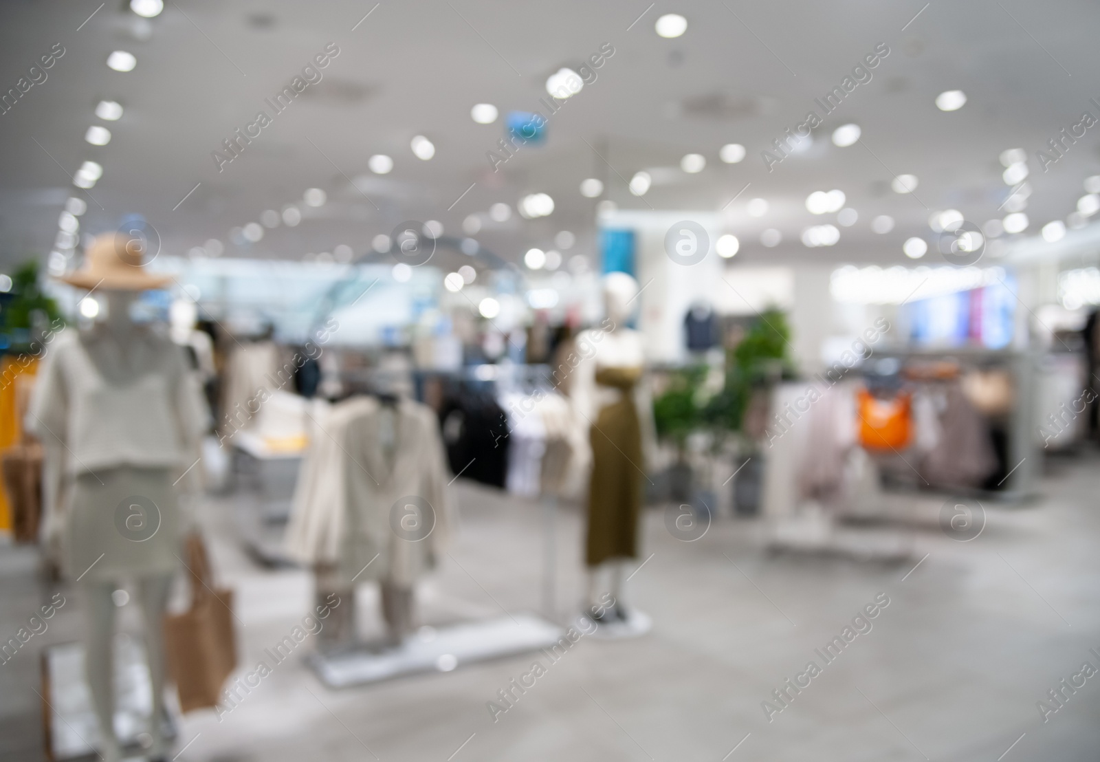 Photo of Blurred view of clothing store, bokeh effect