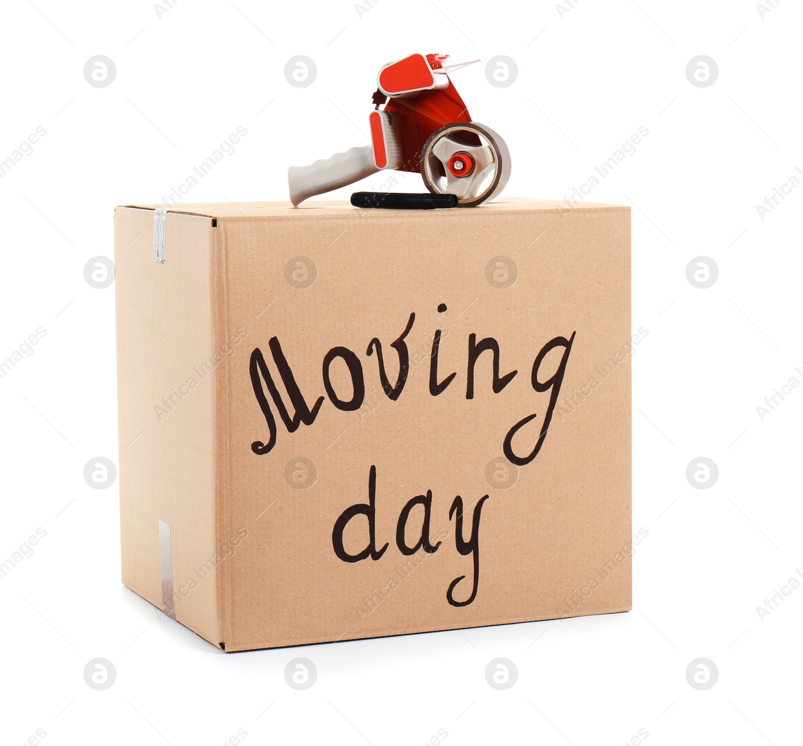 Photo of Moving box, marker and adhesive tape dispenser on white background