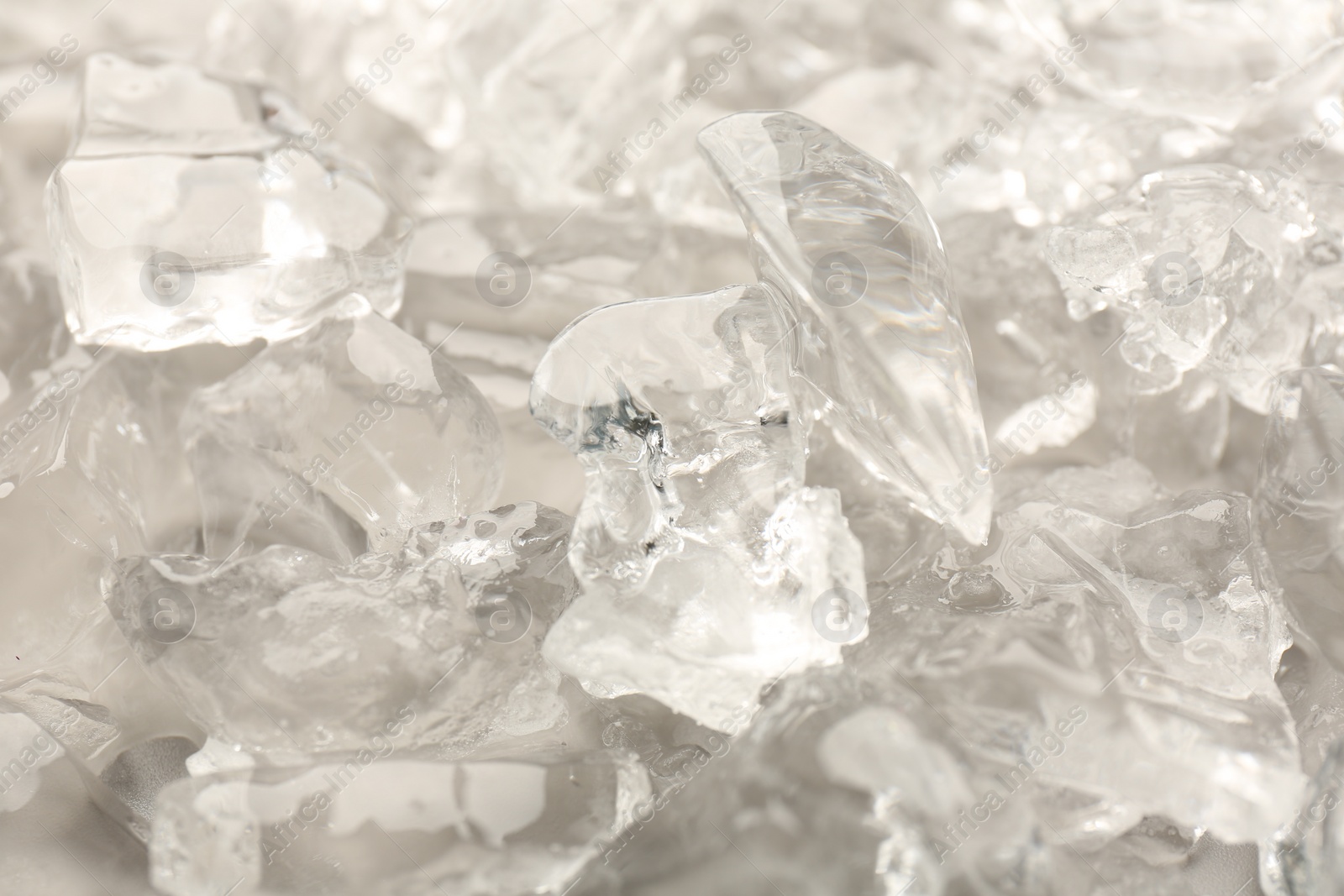 Photo of Pieces of crushed ice as background, closeup