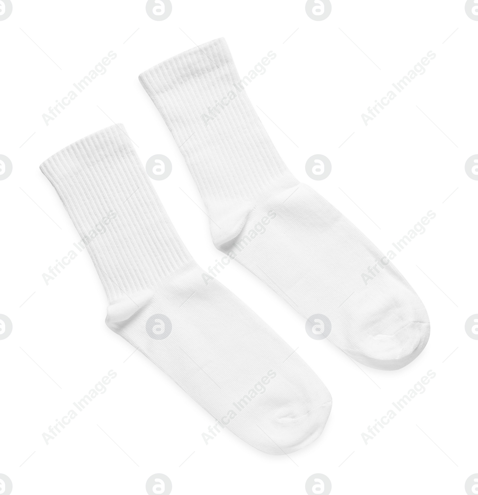 Photo of Pair of stylish clean socks isolated on white, top view