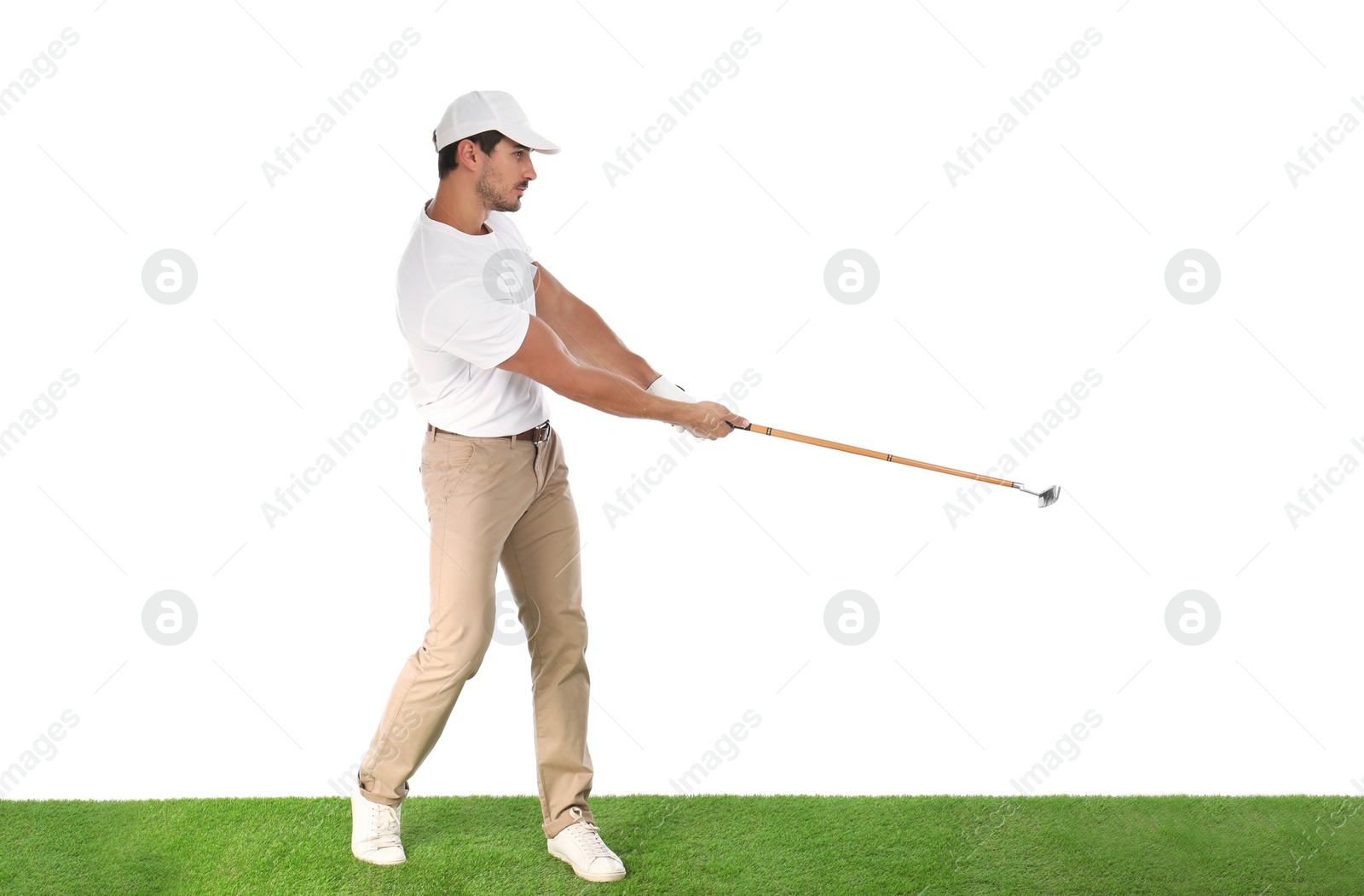 Photo of Young man playing golf on white background