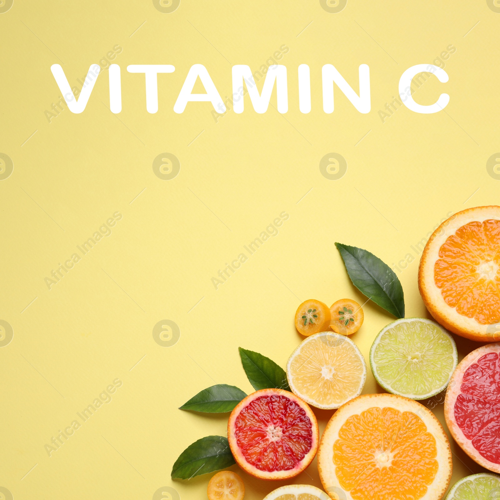 Image of Source of Vitamin C. Fresh juicy citrus fruits with green leaves on light yellow background, flat lay