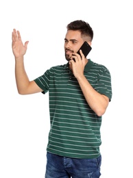 Portrait of handsome young man with mobile phone on white background