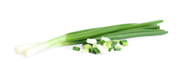 Photo of Fresh green spring onions isolated on white