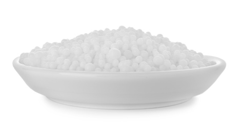 Photo of Pellets of ammonium nitrate isolated on white. Mineral fertilizer