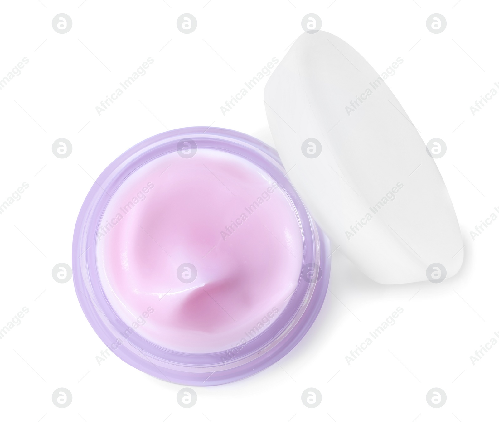 Photo of Jar of organic cream and cap isolated on white, top view