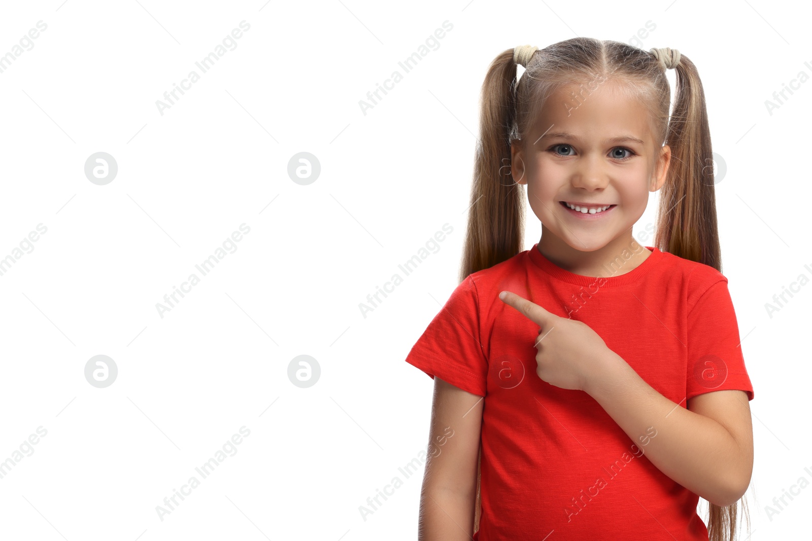 Photo of Special promotion. Little girl pointing at something on white background