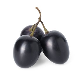 Photo of Delicious ripe dark blue grapes isolated on white