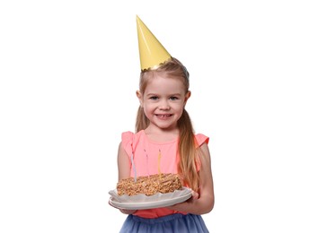 Photo of Birthday celebration. Cute little girl in party hat holding tasty cake on white background