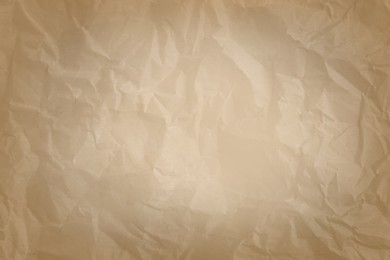 Image of Crumpled old paper as background. Texture of parchment