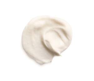 Sample of facial cream isolated on white, top view