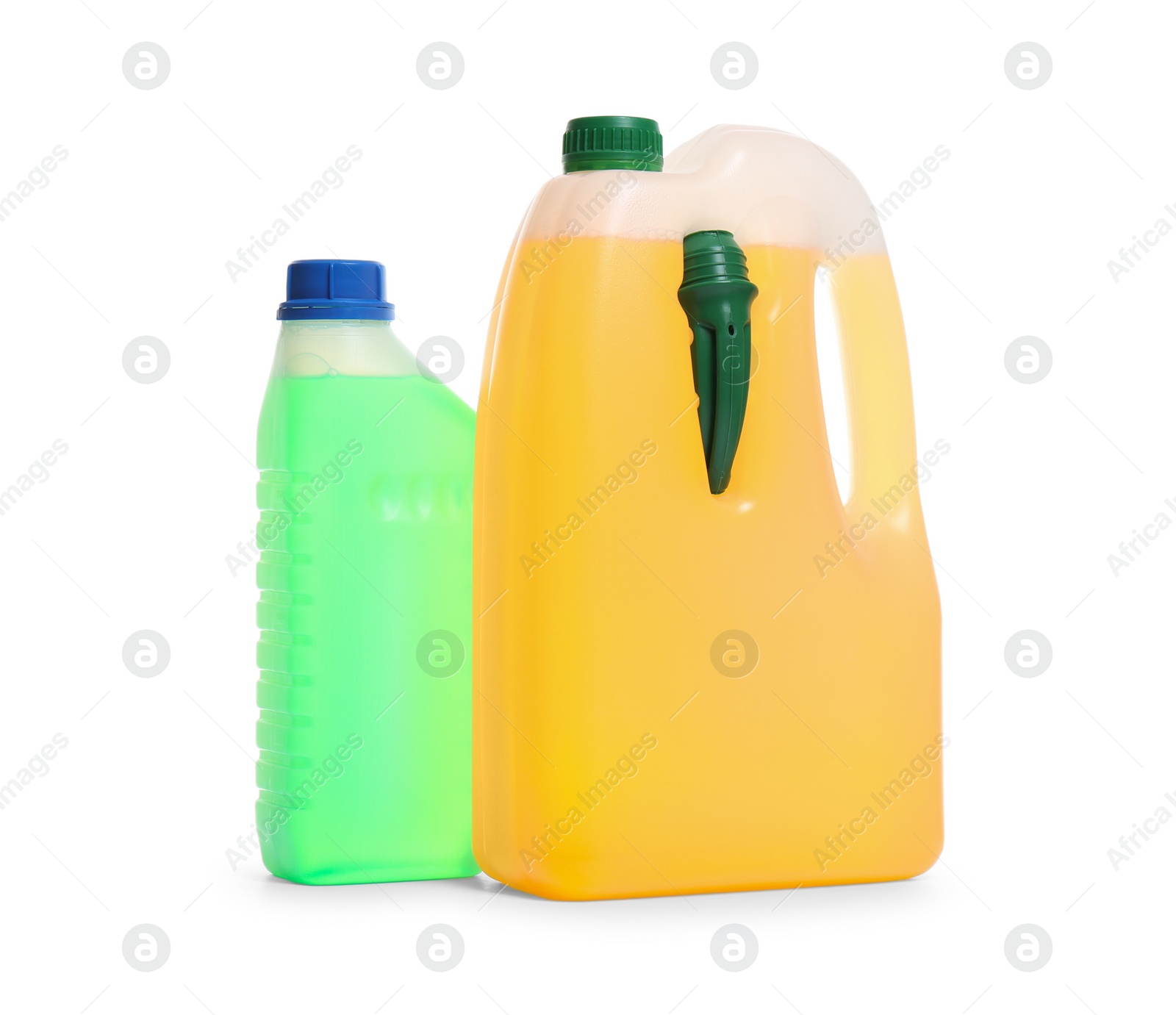 Photo of Plastic canisters with different liquids for car on white background