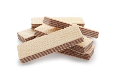 Photo of Delicious crispy wafers on white background. Sweet food