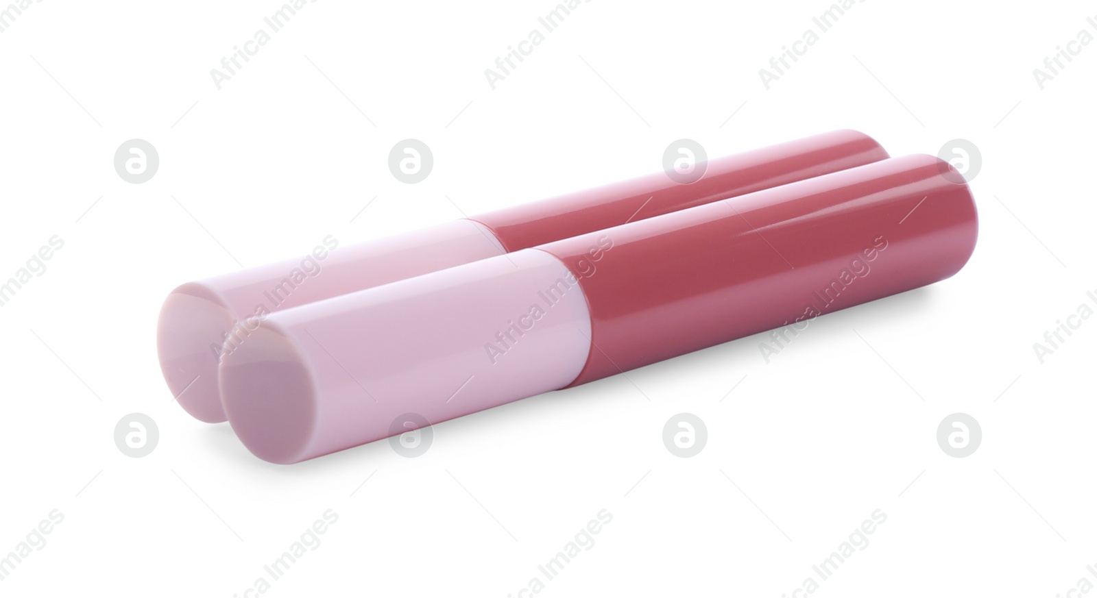 Photo of Two pink lip glosses isolated on white