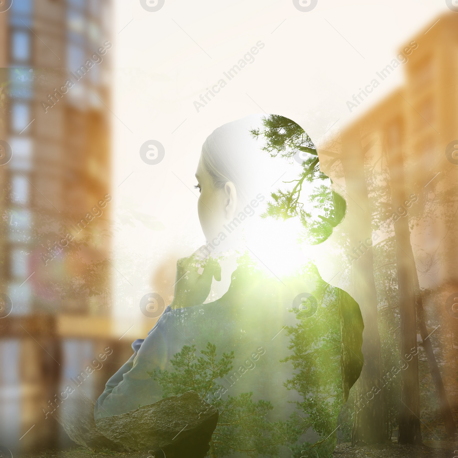 Image of Double exposure of businesswoman and green forest in city
