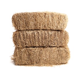 Bales of dried straw isolated on white