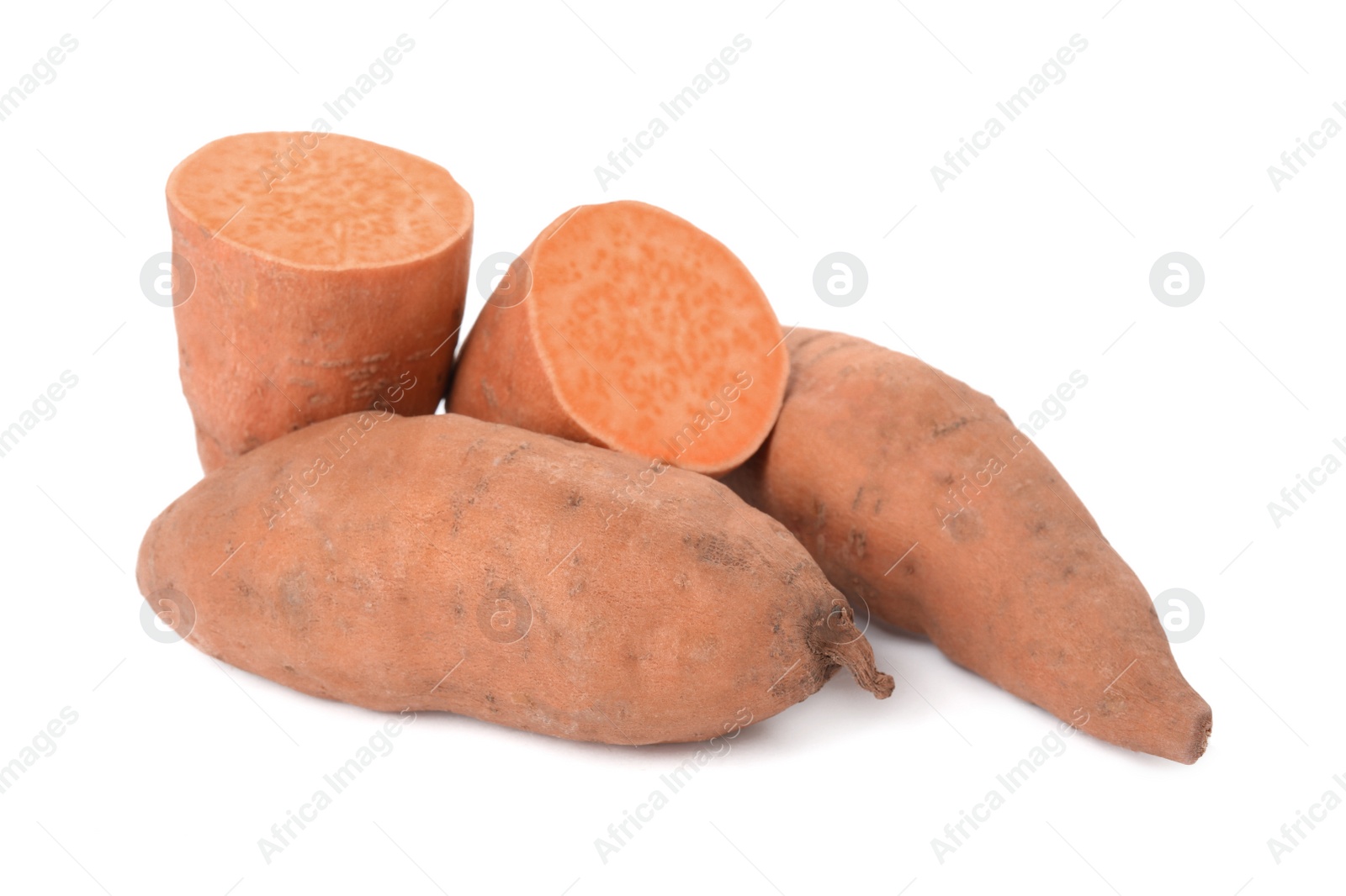 Photo of Whole and cut ripe sweet potatoes on white background