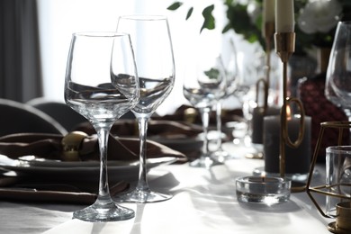 Photo of Festive table setting with beautiful decor indoors