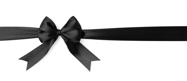 Black satin ribbon with bow isolated on white, top view