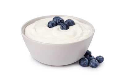 Photo of Bowl of delicious yogurt with blueberries on white background