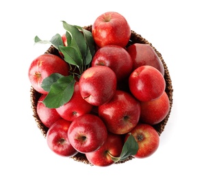 Photo of Juicy red apples in wicker basket on white background, top view
