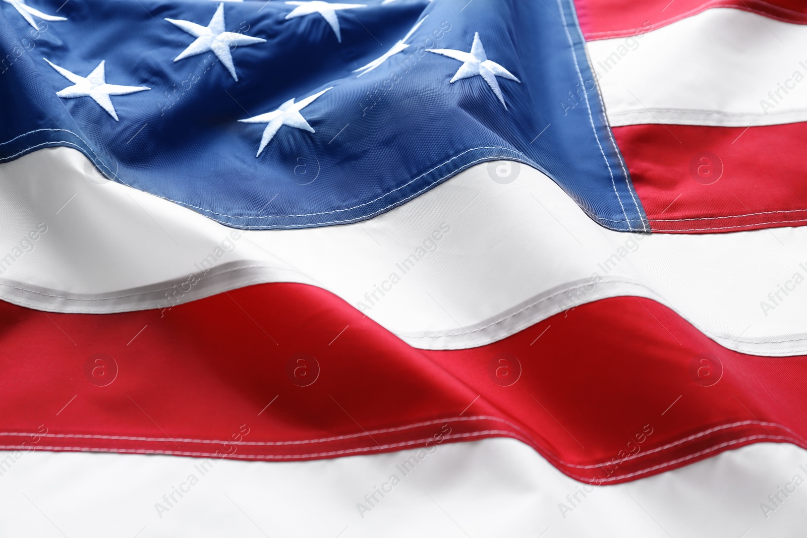 Photo of American flag as background, closeup. National symbol