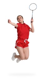 Young woman playing badminton with racket on white background