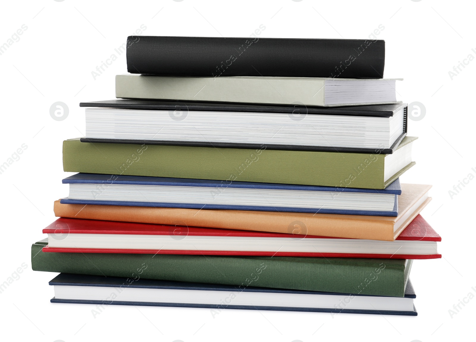 Photo of Many different books stacked on white background