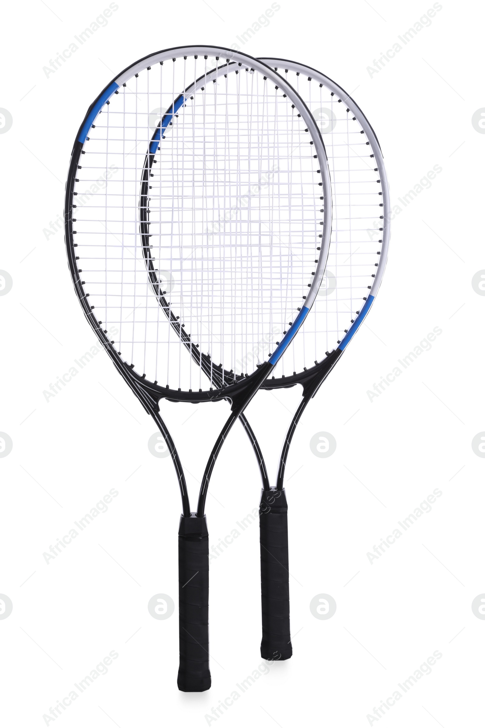 Photo of Two tennis rackets on white background. Sports equipment