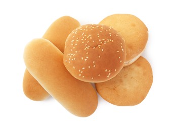 Tasty fresh burger and hotdog buns isolated on white, top view