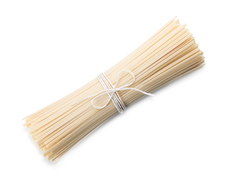 Photo of Raw rice noodles isolated on white, top view