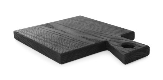 Photo of Black wooden cutting board isolated on white