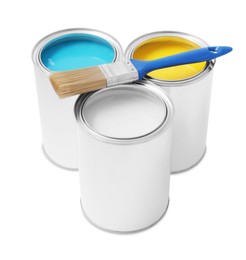 Photo of Cans with different paints and brush on white background