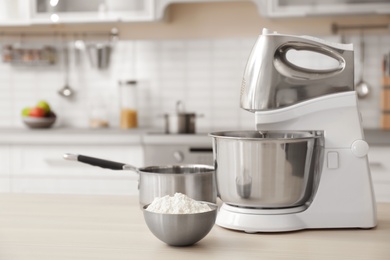 Photo of Houseware and blurred view of kitchen interior on background