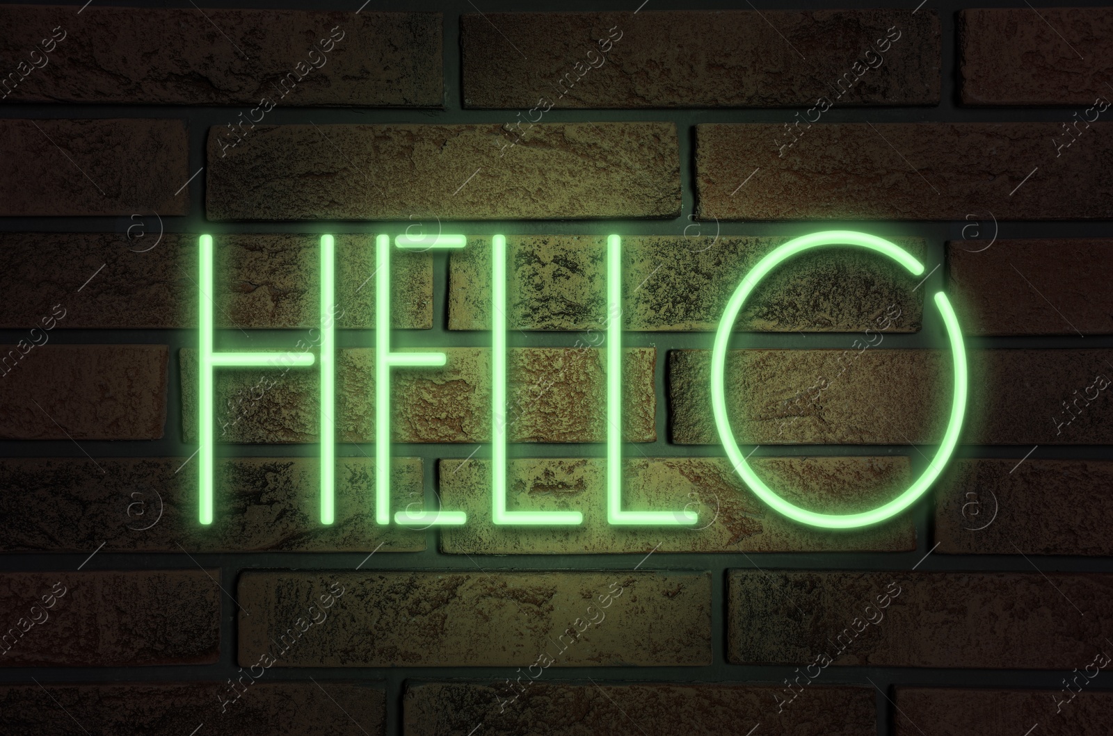 Image of Stylish neon sign with word Hello on brick wall