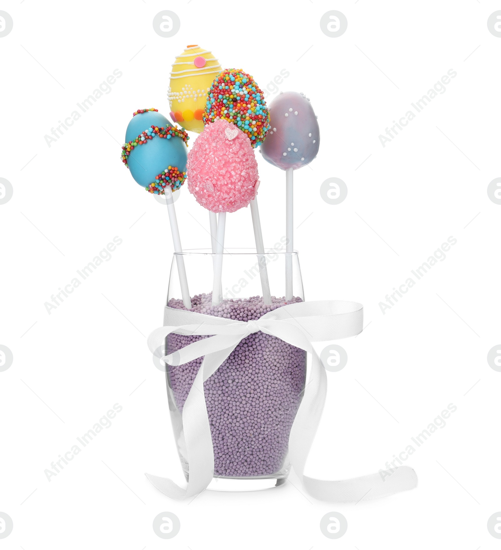 Photo of Delicious egg shaped cake pops on white background. Easter holiday