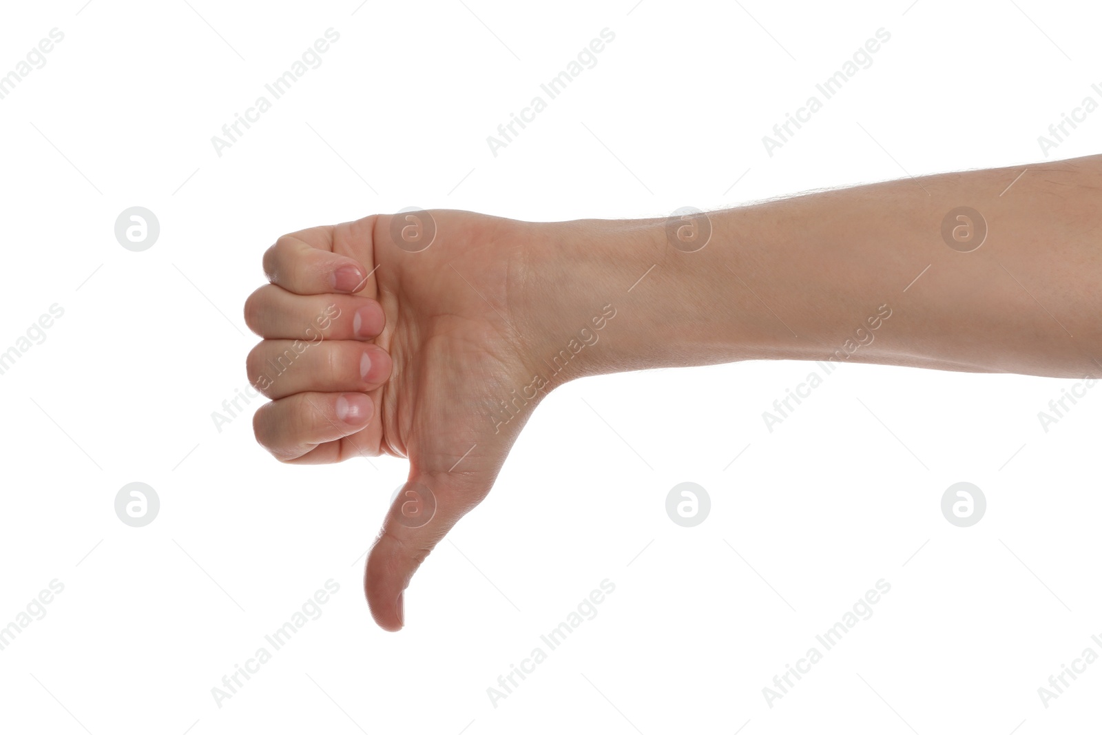 Photo of Man showing thumb down gesture against white background, closeup of hand