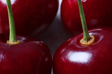 Photo of Ripe cherries as background, macro view. Fresh berry