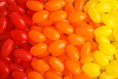 Photo of Delicious jelly beans of different colors, closeup